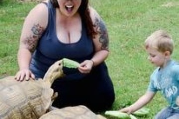 a person holding an animal