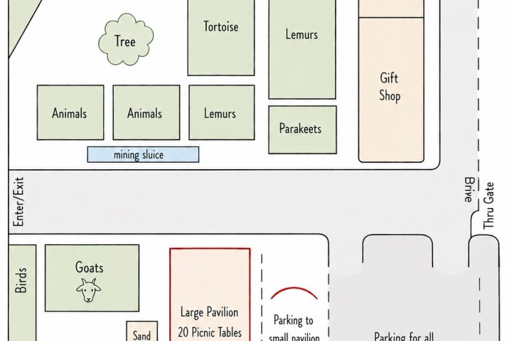 Zoo map with animal areas, picnic tables, and parking.